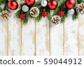 Christmas decorations, red balls and pine cones on 59044912