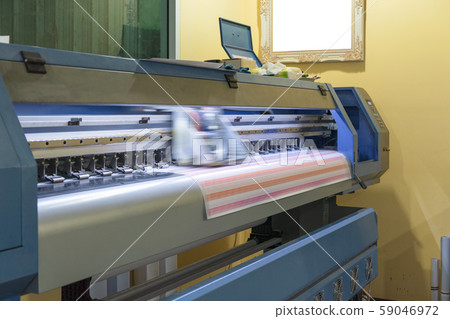 Large format inkjet printer working on sticker Large format inkjet printer working on sticker 59046972
