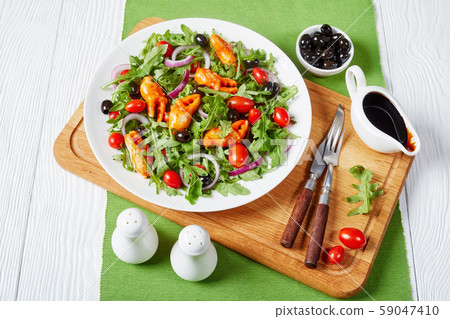 rocket crab clamps salad on a plate rocket crab clamps salad on a plate 59047410