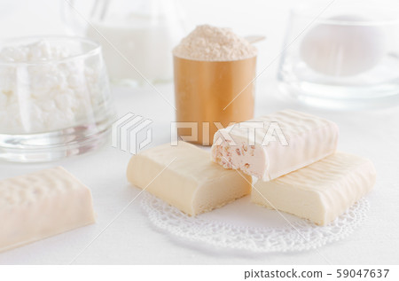 protein products such as whey powder, snack bar and egg with milk and curd 59047637