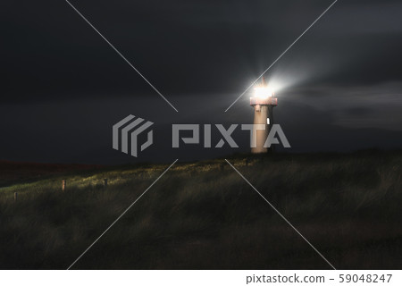 Lighthouse at night on Sylt island, at North sea, Lighthouse at night on Sylt island, at North sea, 59048247