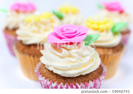 Cupcakes Cup Cakes With Colorful Icing or Frosting Cupcakes Cup Cakes With Colorful Icing or Frosting 59048741