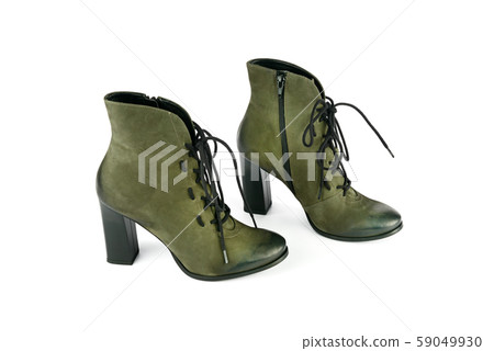 Elegant outfit. Stylish suede ankle boots isolated Elegant outfit. Stylish suede ankle boots isolated 59049930