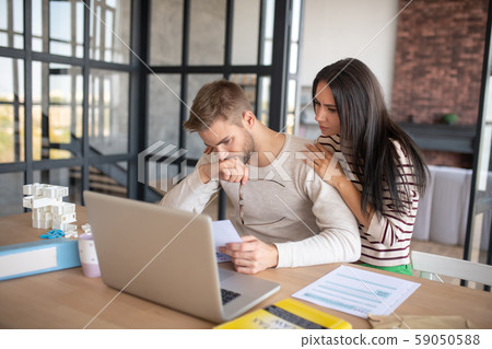 Husband feeling upset after filling tax declaration 59050588