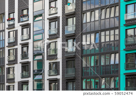 Angular view of new apartment building wall 59052474