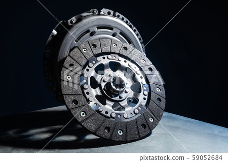 Brake disc plate on black background with shadow 59052684