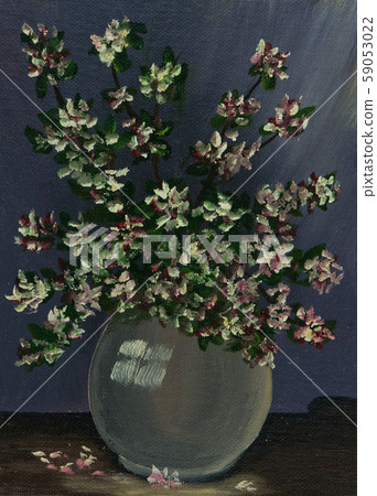 Flowers in a vase in front of blue purple Flowers in a vase in front of blue purple 59053022