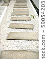 Stone walkway in the pool 59054203