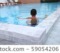 boy swimming in the pool 59054206