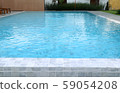 boy swimming in the pool 59054208