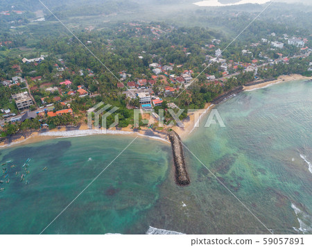 Aerial view of fishermen village in sri lanka Aerial view of fishermen village in sri lanka 59057891