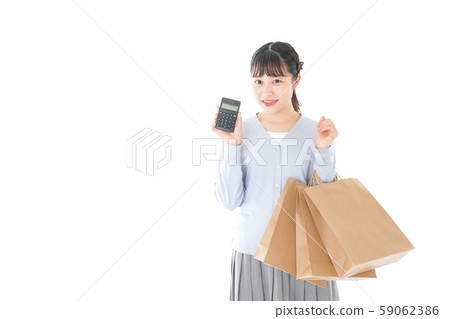 Young woman enjoying shopping Young woman enjoying shopping 59062386