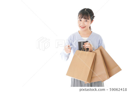Young woman enjoying shopping Young woman enjoying shopping 59062418