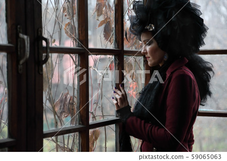 Portrait of a young sexy witch wearing 59065063