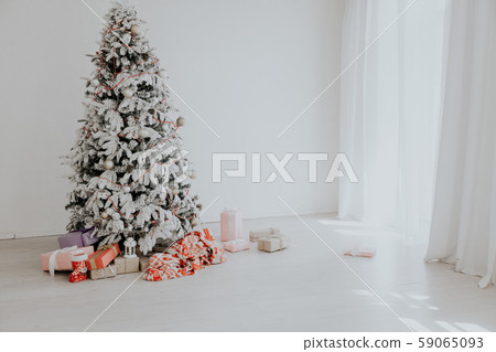 White Christmas tree in the room with gifts White Christmas tree in the room with gifts 59065093