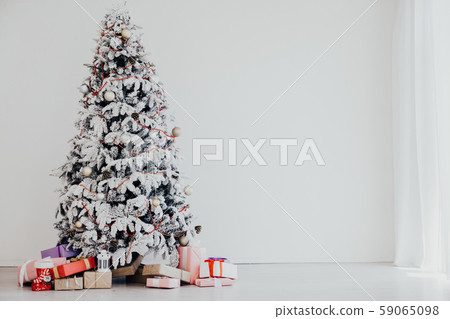 Christmas tree with presents, Garland lights new year winter holiday Christmas tree with presents, Garland lights new year winter holiday 59065098