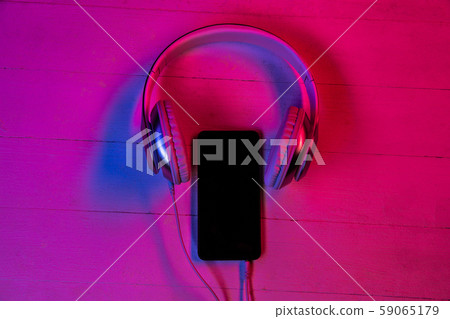 Top view of set of gadgets in purple neon light Top view of set of gadgets in purple neon light 59065179