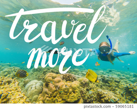 TRAVEL MORE concept Happy woman in snorkeling mask dive underwater with tropical fishes in coral TRAVEL MORE concept Happy woman in snorkeling mask dive underwater with tropical fishes in coral 59065181
