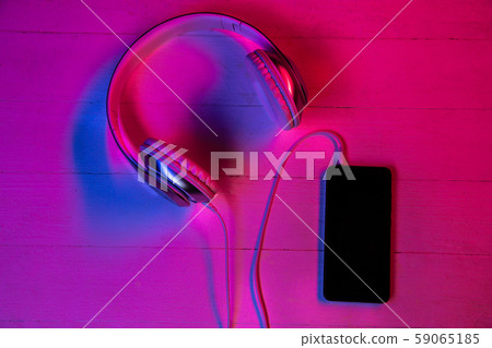 Top view of set of gadgets in purple neon light Top view of set of gadgets in purple neon light 59065185