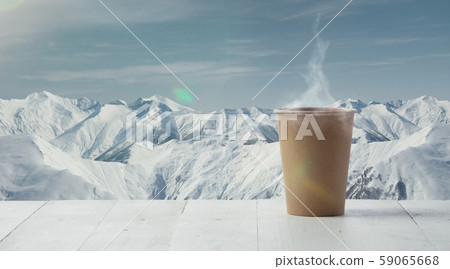 Single tea or coffee mug and landscape of mountains on background Single tea or coffee mug and landscape of mountains on background 59065668