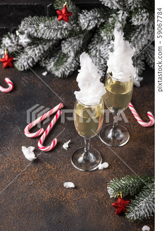 Champagne or prosecco with cotton candy Champagne or prosecco with cotton candy 59067784