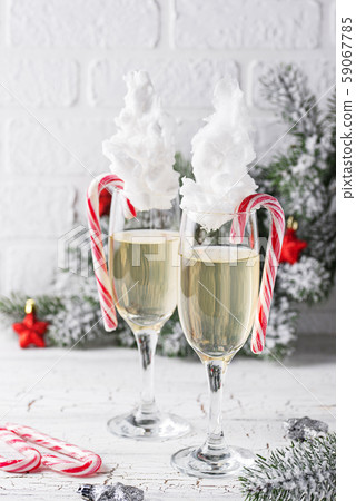 Champagne or prosecco with cotton candy Champagne or prosecco with cotton candy 59067785