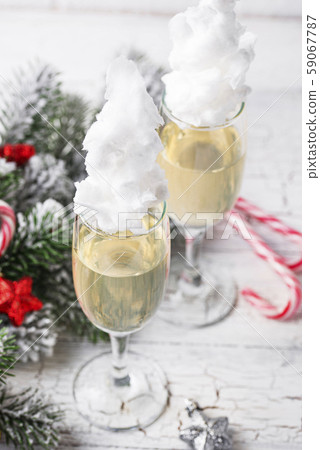Champagne or prosecco with cotton candy Champagne or prosecco with cotton candy 59067787