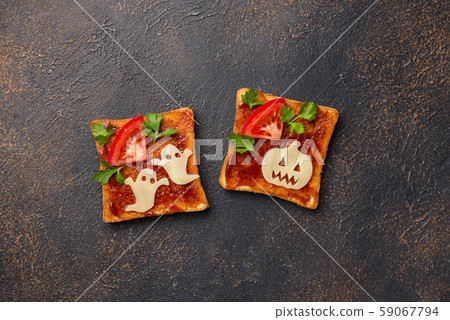 Halloween sandwiches toasts with ghost and pumpkin Halloween sandwiches toasts with ghost and pumpkin 59067794