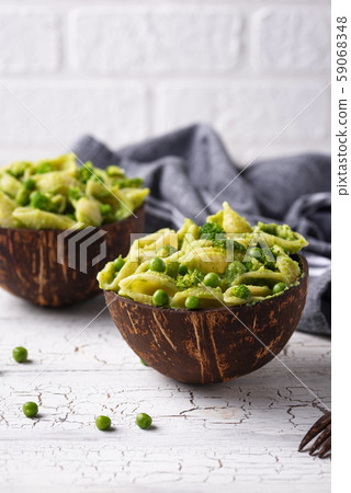 Vegan pasta with green sauce 59068348