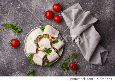 Lavash rolls with chicken and vegetables Lavash rolls with chicken and vegetables 59068363