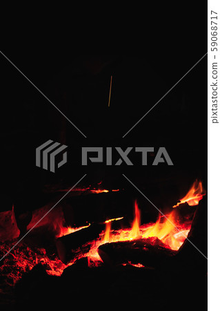 Burning fire in a fireplace, vertical photo 59068717