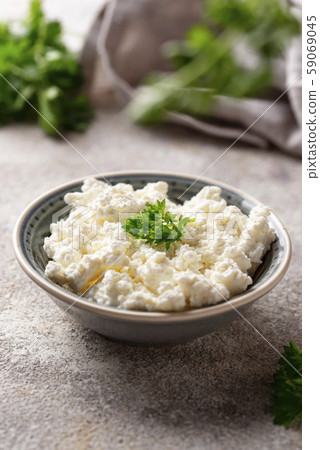 Bowl with homemade cottage cheese Bowl with homemade cottage cheese 59069045
