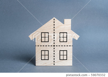 Residential building divided by a dotted line into four equal parts. Divorce concept. Disputes over division process of real estate and property after divorce. Distribution of the right 59070332