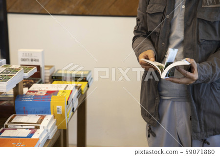 A man reading a book A man reading a book 59071880