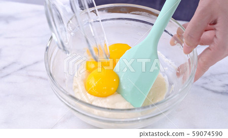 Batter blending making cake stirring mixing batter バッター mixing yolk ケーキ作り Batter blending making cake stirring mixing batter バッター mixing yolk ケーキ作り 59074590