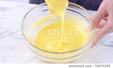 Batter blending making cake stirring mixing batter バッター mixing yolk ケーキ作り Batter blending making cake stirring mixing batter バッター mixing yolk ケーキ作り 59074595