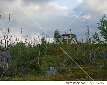 Abadoned Sami hut Goathi in green hills landscape Abadoned Sami hut Goathi in green hills landscape 59075767