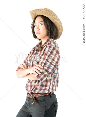 Young woman in a plaid shirt and arms crossed Young woman in a plaid shirt and arms crossed 59078788