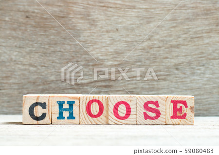 Letter block in word choose on wood background 59080483