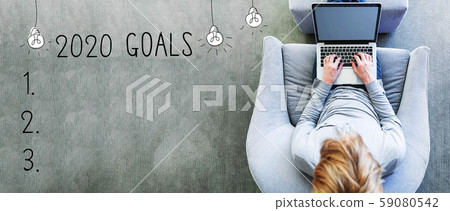 2020 goals with man using a laptop 59080542