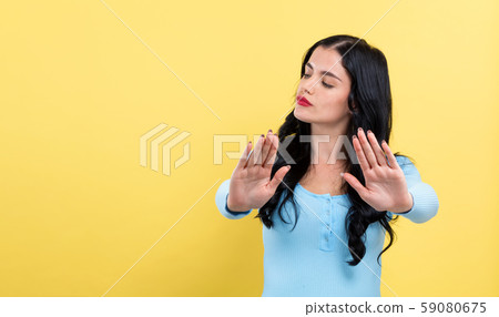 Young woman making a rejection pose 59080675