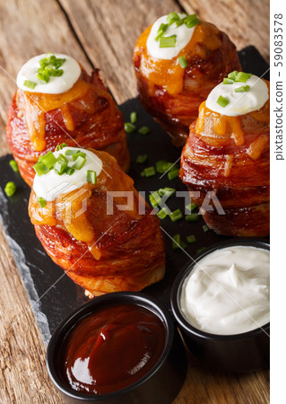 Volcano potatoes with cheese, bacon, sour cream 59083578