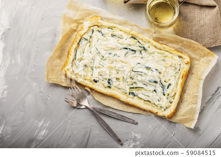 homemade tart with ricotta and zucchini 59084515