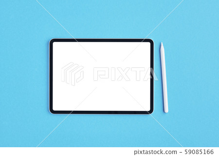 Tablet with white pencil on blue background. Tablet with white pencil on blue background. 59085166