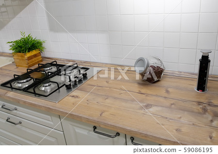 silver gas stove located on wooden kitchen set surface 59086195