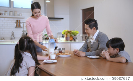 Holiday concept. The family is having breakfast 59087657