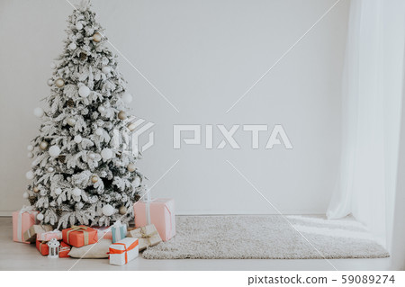 Christmas tree white background interior room new year gifts holidays Christmas tree white background interior room new year gifts holidays 59089274