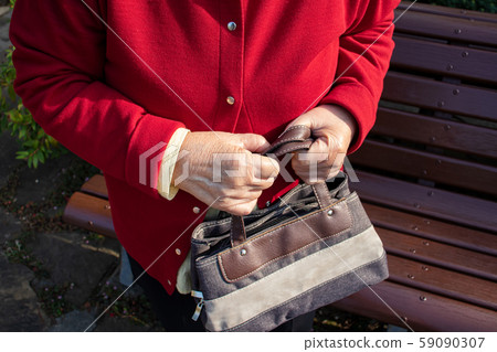 Elderly woman with bag Elderly woman with bag 59090307