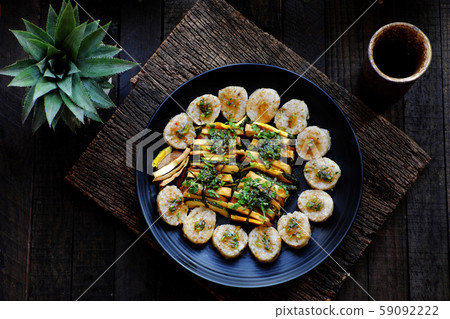 Top view vegan Vietnamese eating indoor restaurant, vegetarian rice rolls cut in slice with vegetable 59092222