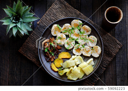 Top view vegan Vietnamese eating indoor restaurant, vegetarian rice rolls cut in slice with vegetable 59092223